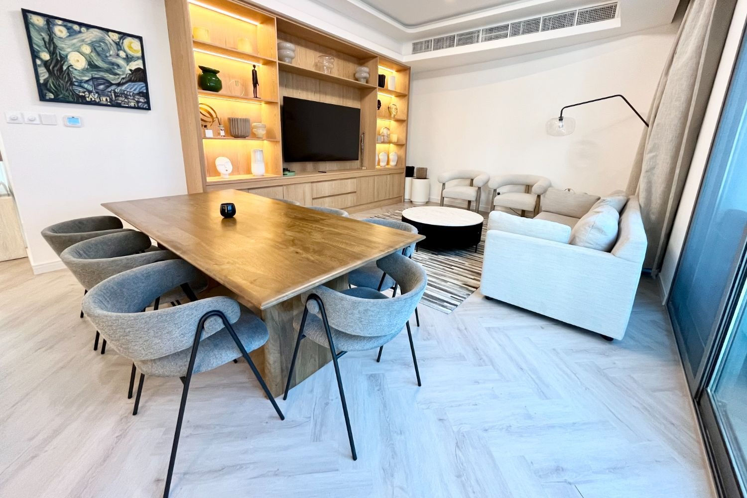 Dining and living with joinery wall