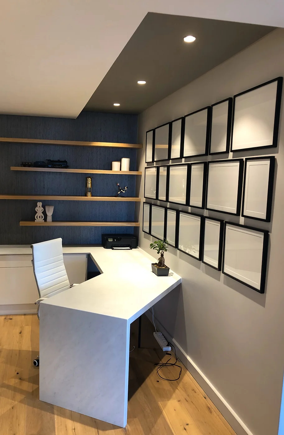 Home office with gallery wall